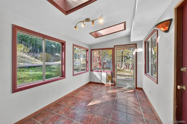 a view of a room with a large window