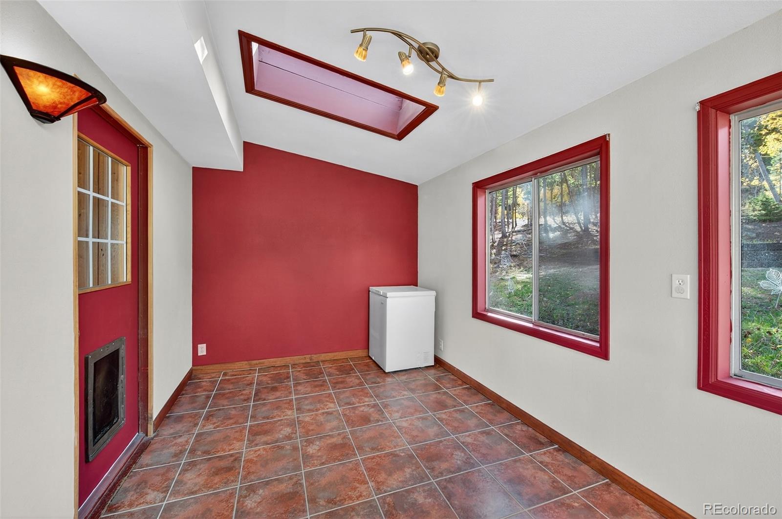 20341 Maxwell Drive Morrison, CO 80465 - Photo 7 of 47 a view of an entryway with a window