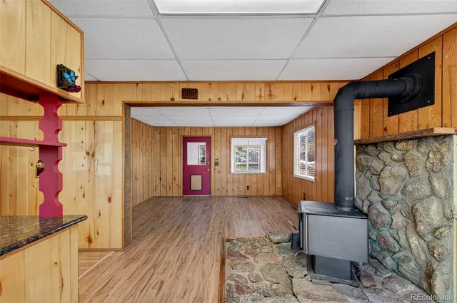 a view of an entryway with wooden walls