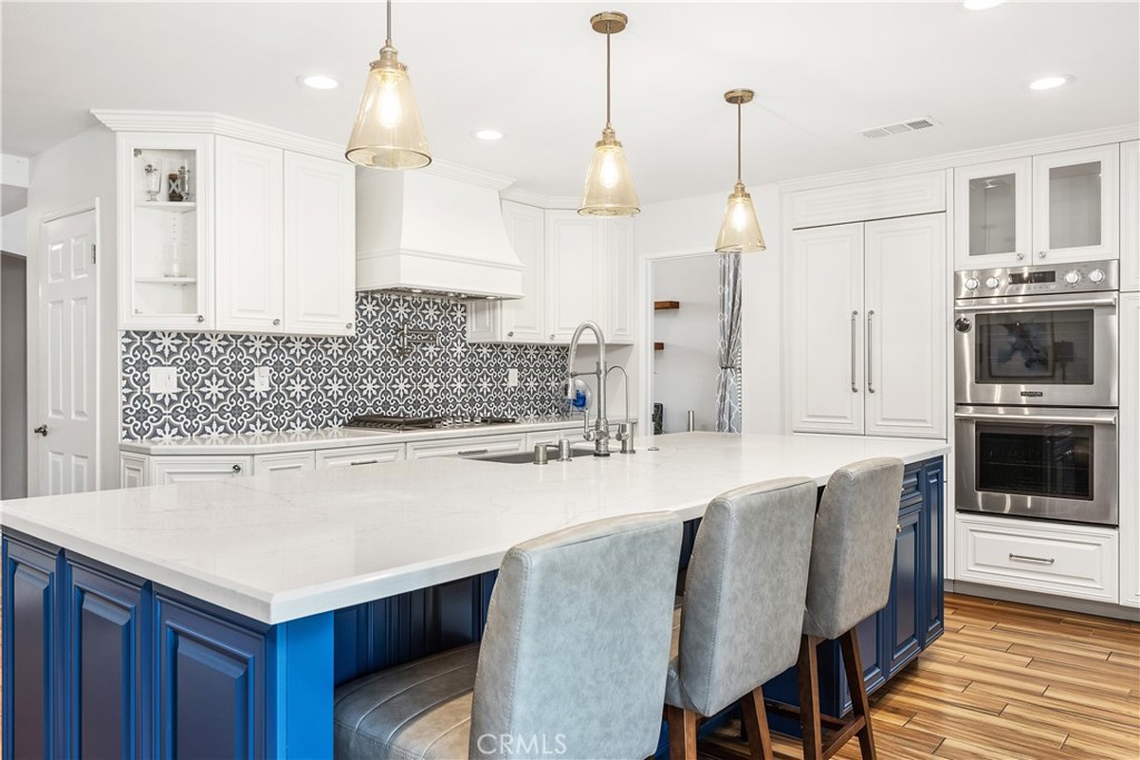 6059 Rio Valle Drive Bonsall, CA 92003 - Photo 18 of 46 Seating at island