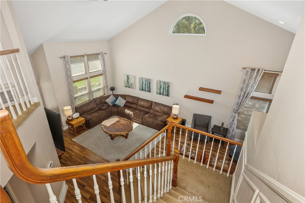 6059 Rio Valle Drive Bonsall, CA 92003 - Photo 28 of 46 Grand staircase to upstairs rooms