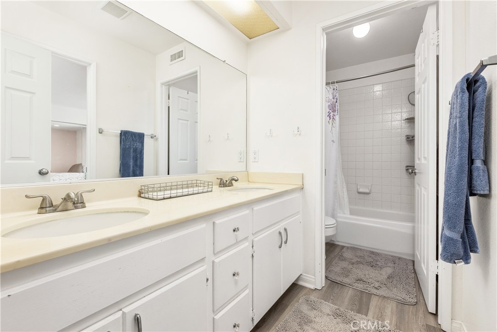 6059 Rio Valle Drive Bonsall, CA 92003 - Photo 38 of 46 Jack n Jil bathroom with dual sinks
