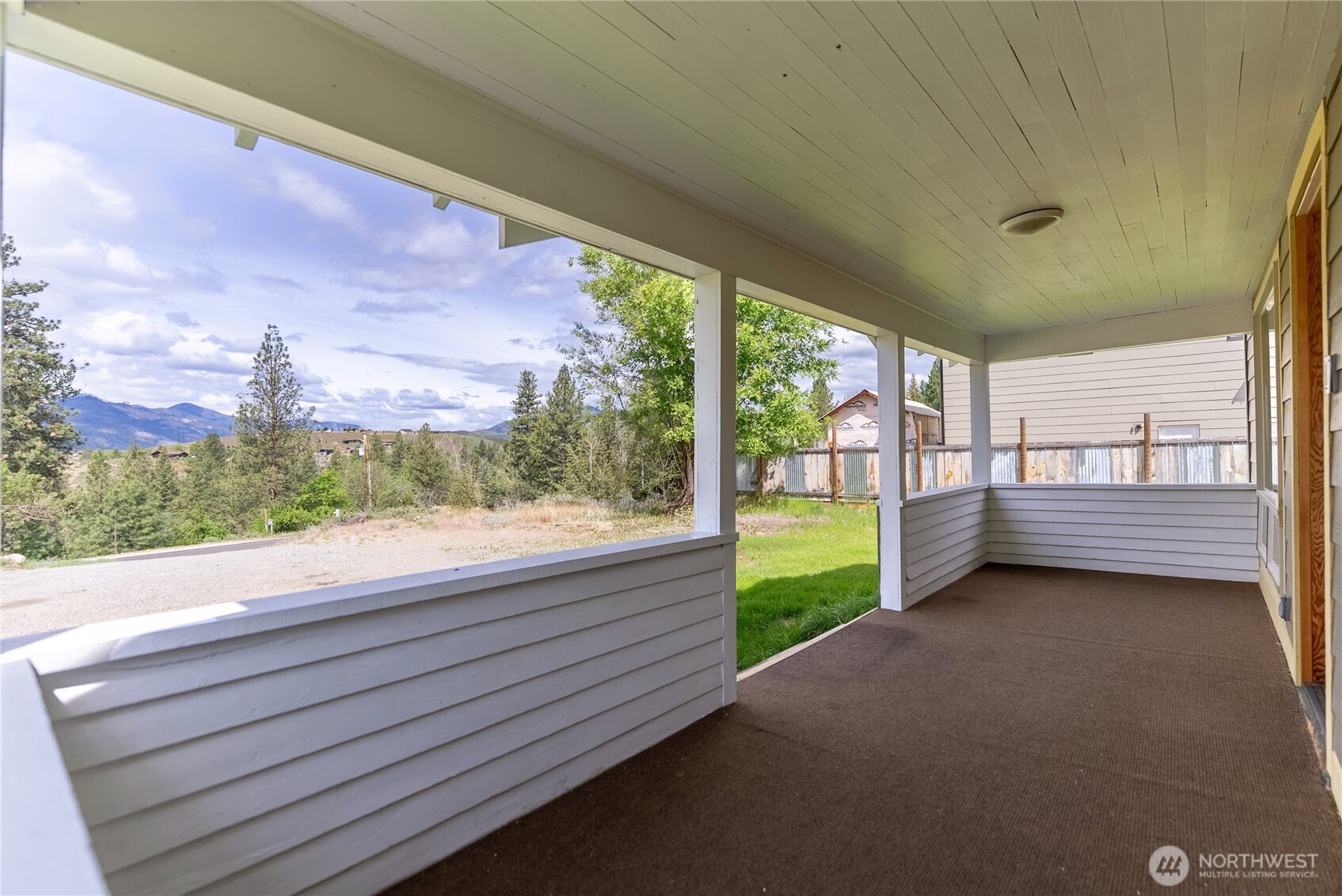 511 Bluff Street Winthrop, WA 98862 - Photo 32 of 38 a view of a porch and garden
