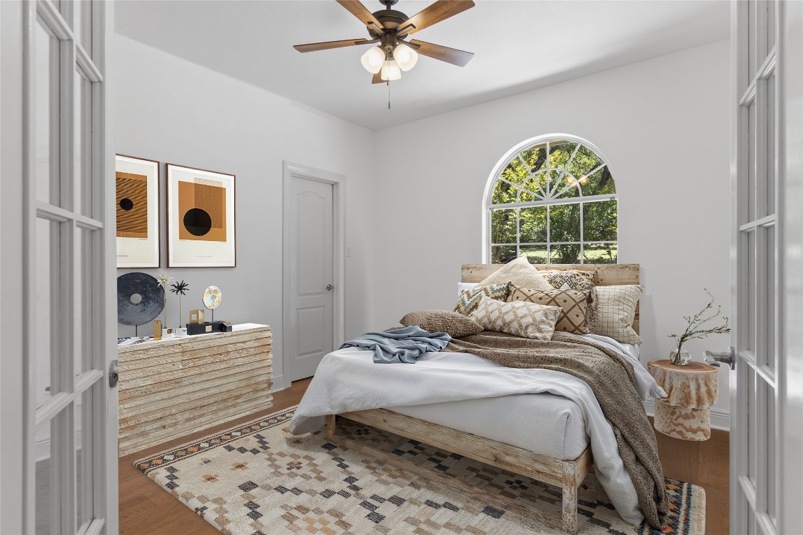 18408 West Rim Drive Jonestown, TX 78645 - Photo 15 of 30 a bedroom with a bed and a window