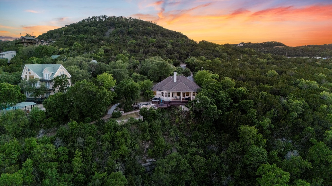 18408 West Rim Drive Jonestown, TX 78645 - Photo 29 of 30 a view of a house with a mountain in the background
