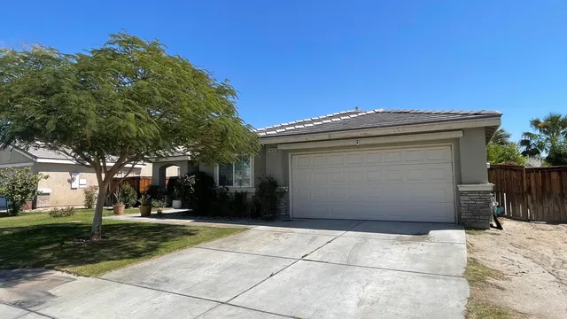 front view of a house with a garage
