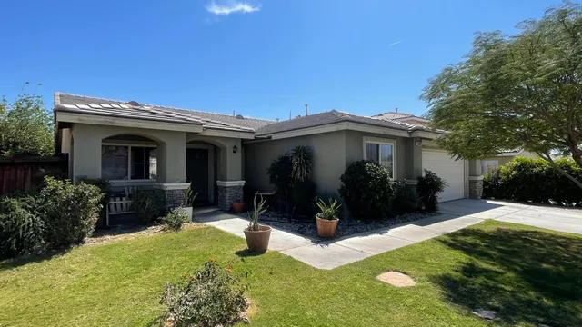 a view of a house with patio