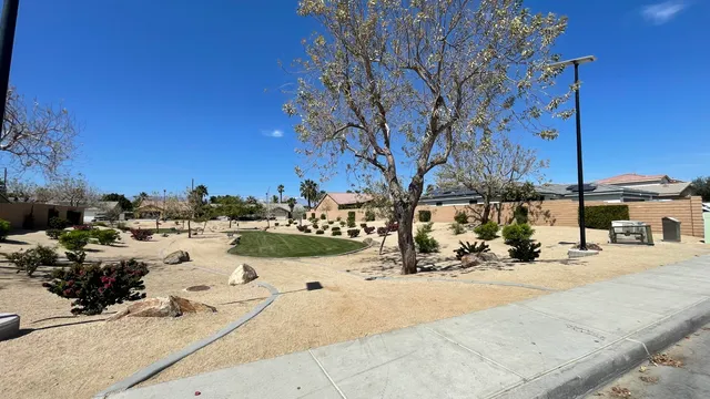 a view of a road with a building in the background