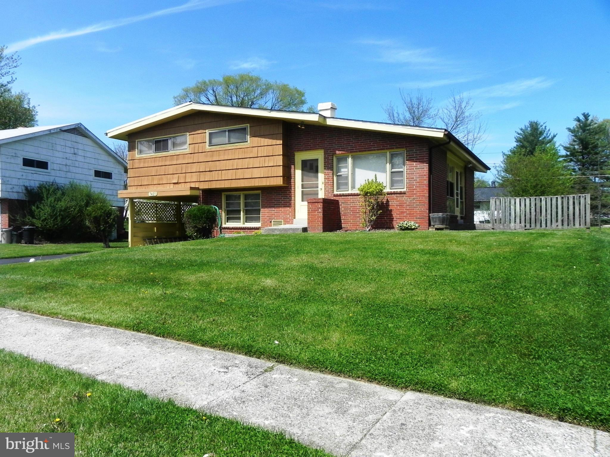 7420 Monita Road Baltimore, MD 21208 - Photo 2 of 24 a view of a house with a yard
