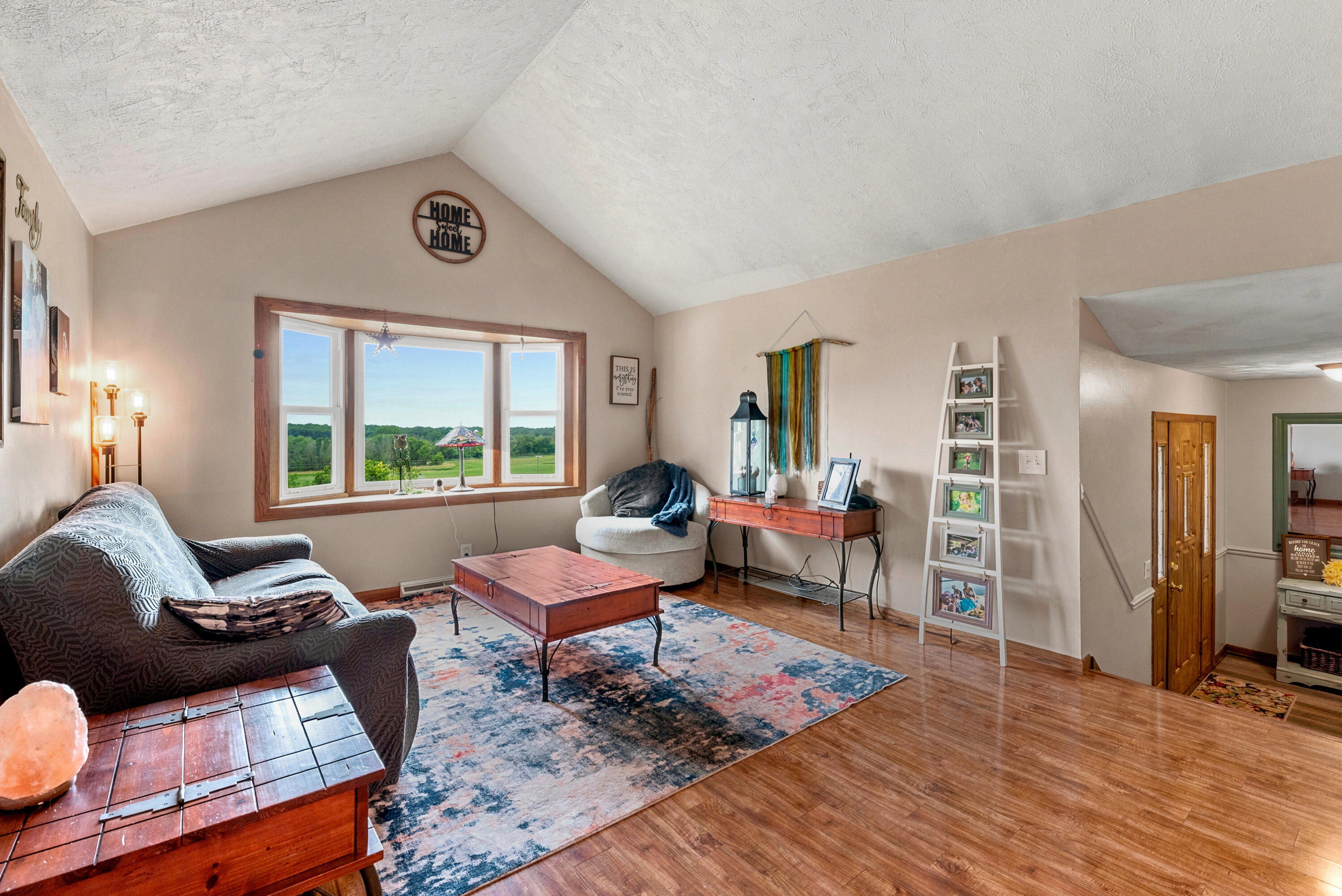 N5506 County Road East Iron Ridge, WI 53035 - Photo 19 of 61 Great Livingroom with Vaulted Ceiling- Main Level
