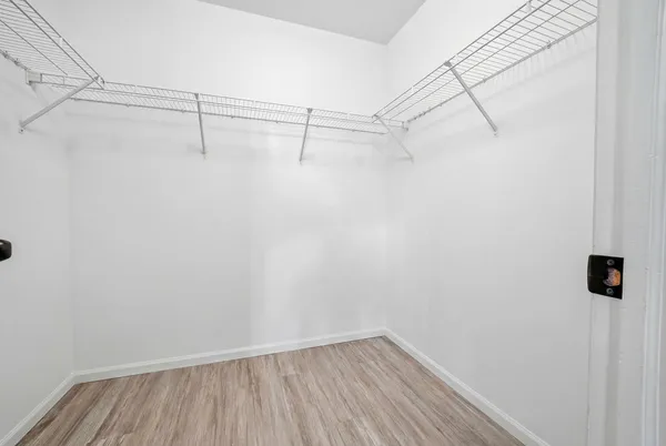 a view of a room with racks on the wall