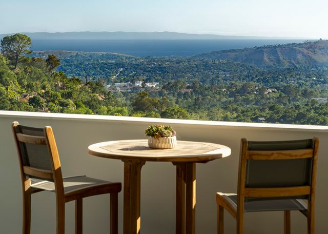 a spacious bathroom with a sink double vanity and a mirror