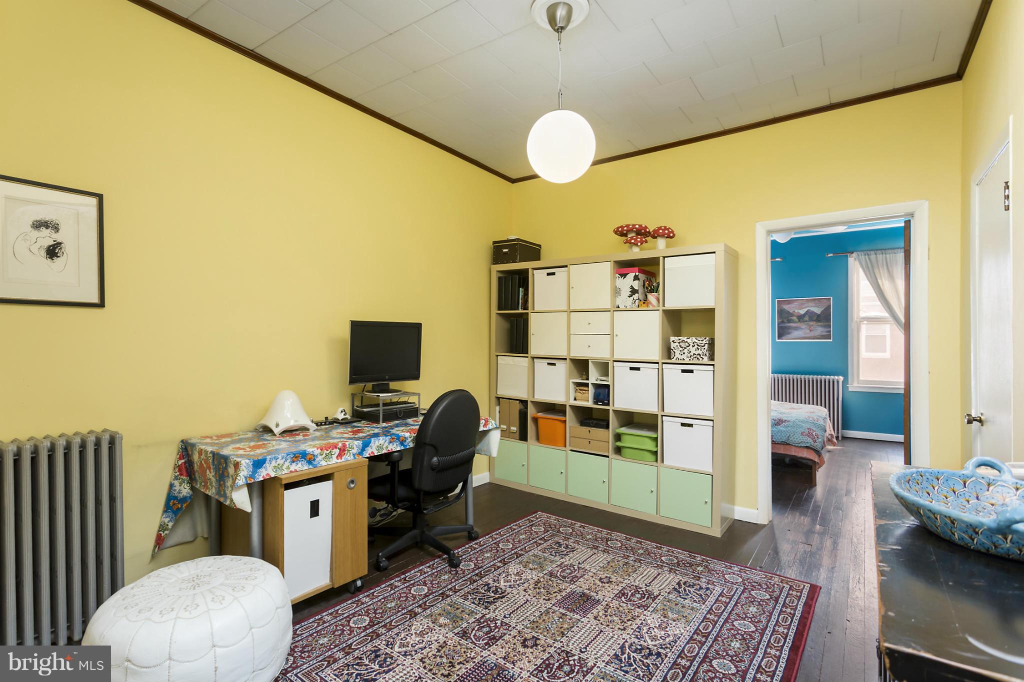 108 Rochester Place Baltimore, MD 21224 - Photo 20 of 24 a workspace with furniture and window