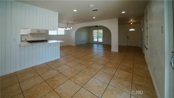 a view of a kitchen with kitchen and sink