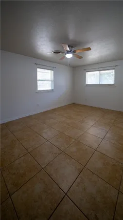 a view of an empty room and window