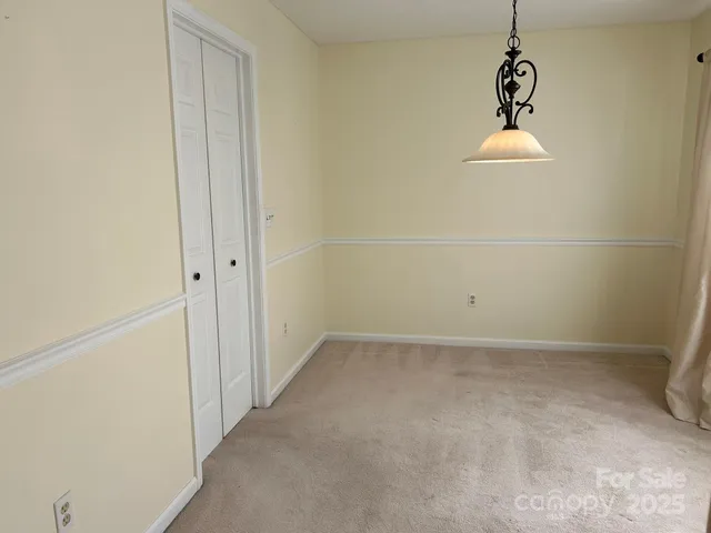 a view of a small space with racks on the wall