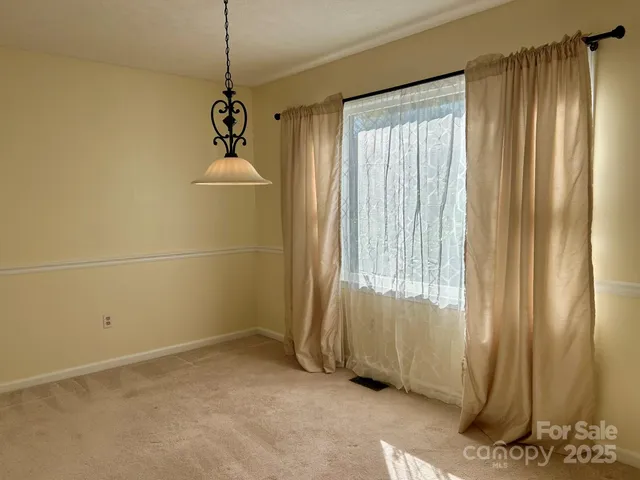 a view of a room with a window