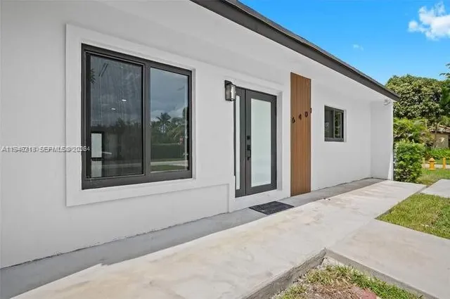 a front view of a house with a porch