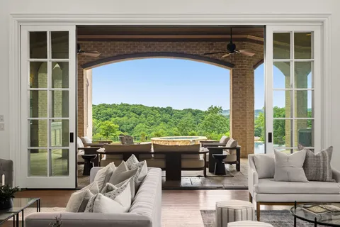 a living room with couch and a window