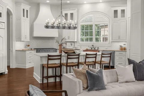 a living room with couch and a window