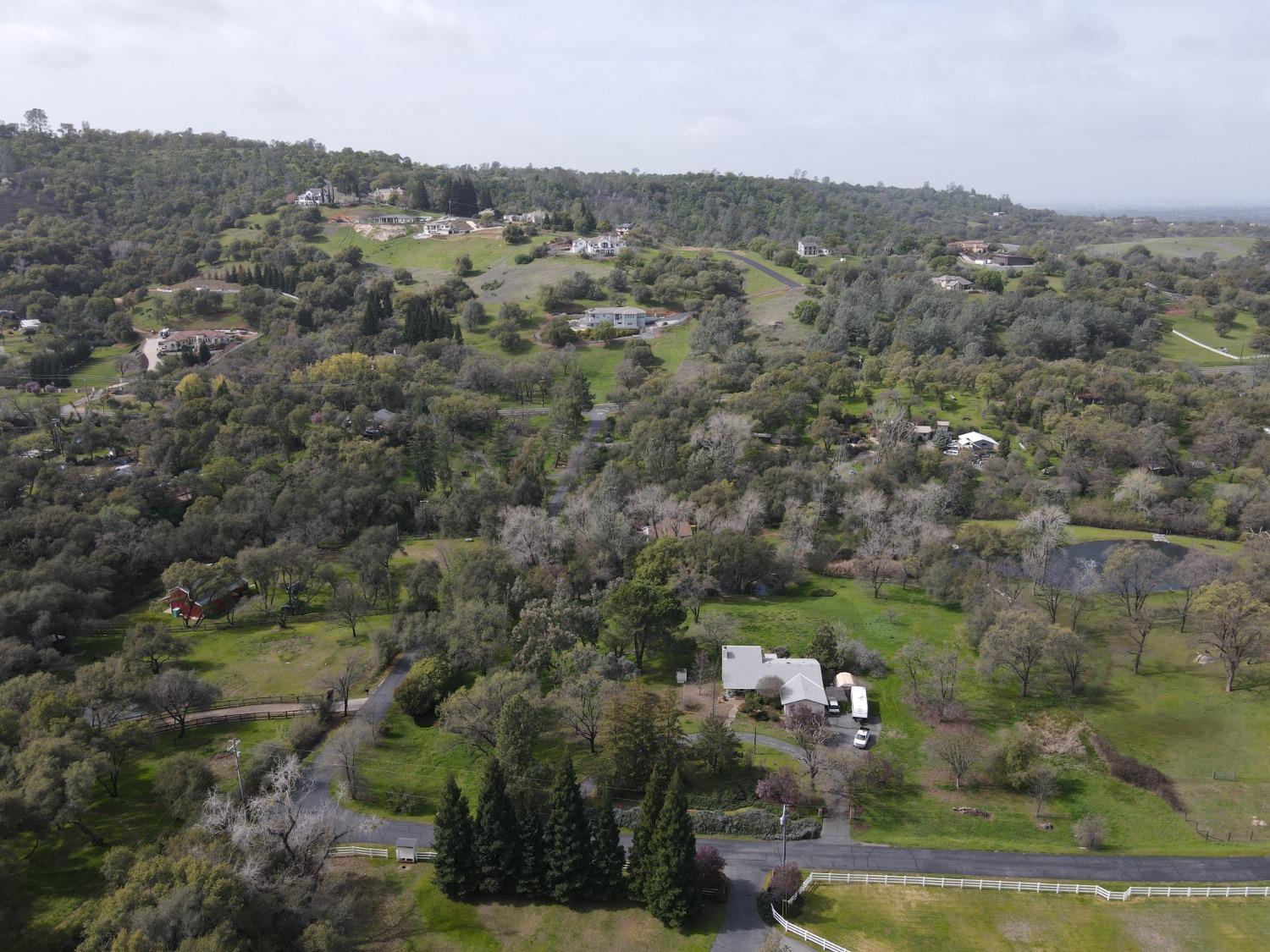 6705 Ravine Court Newcastle, CA 95658 - Photo 13 of 15 an aerial view of town with residential houses with outdoor space and trees