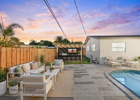 a backyard of a house with lots of green space