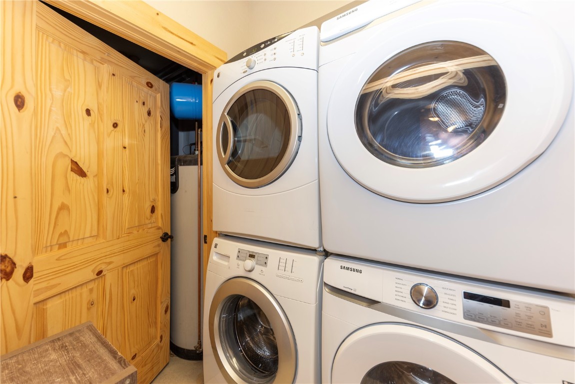 511 Ryan Gulch Road Wildernest, CO 80498 - Photo 23 of 37 Laundry area featuring stacked washing machine and dryer