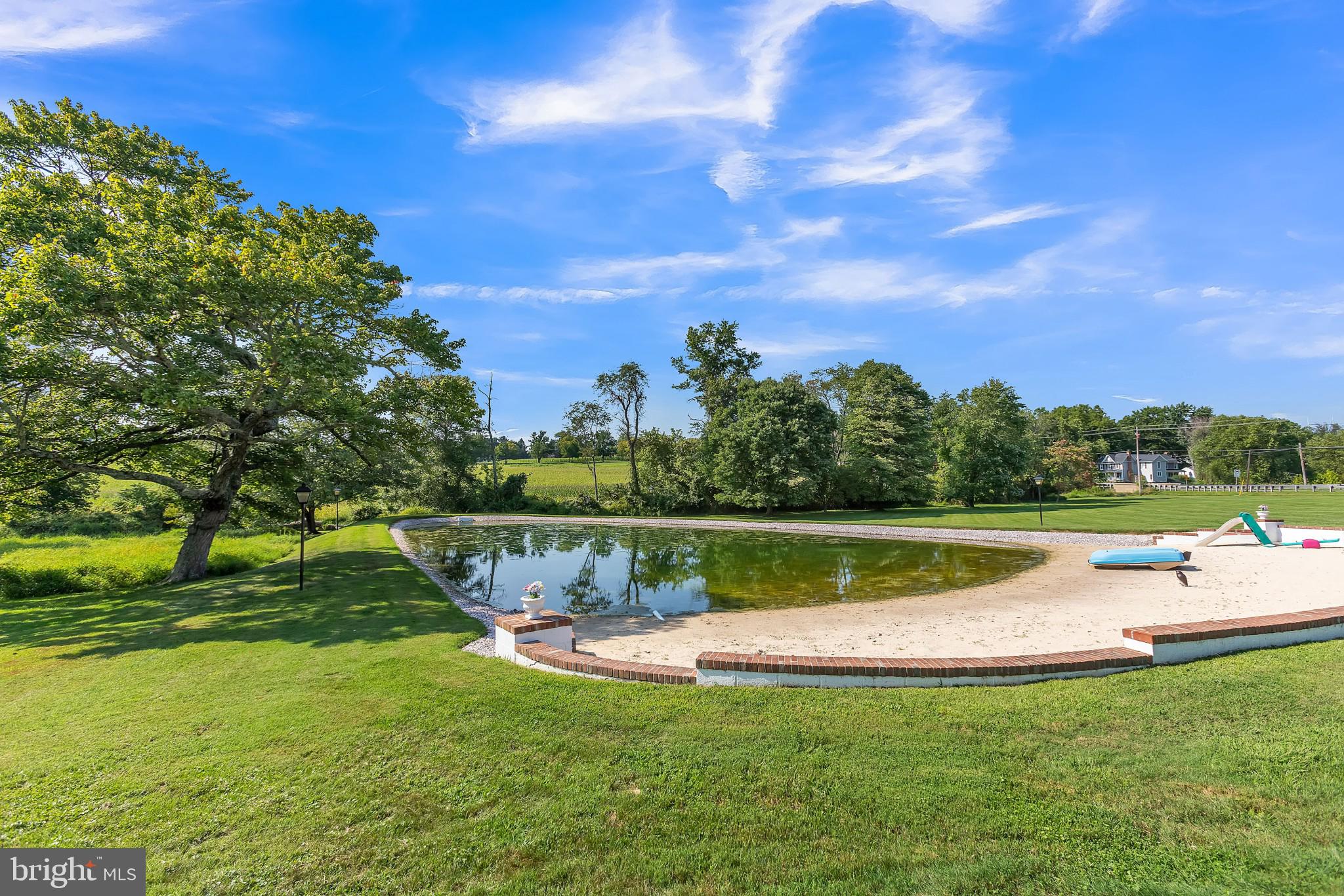 28814 Kemptown Road Damascus, MD 20872 - Photo 28 of 49 a view of a lake with a yard