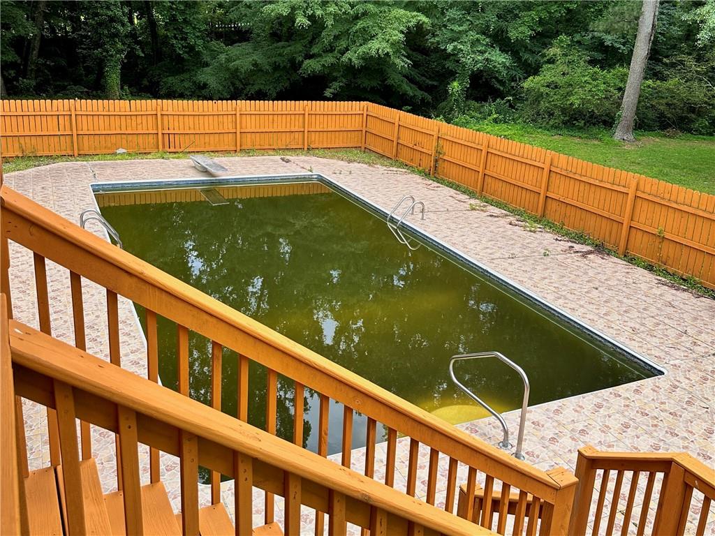 7326 Leland Lane Jonesboro, GA 30236 - Photo 18 of 18 a view of swimming pool from a balcony