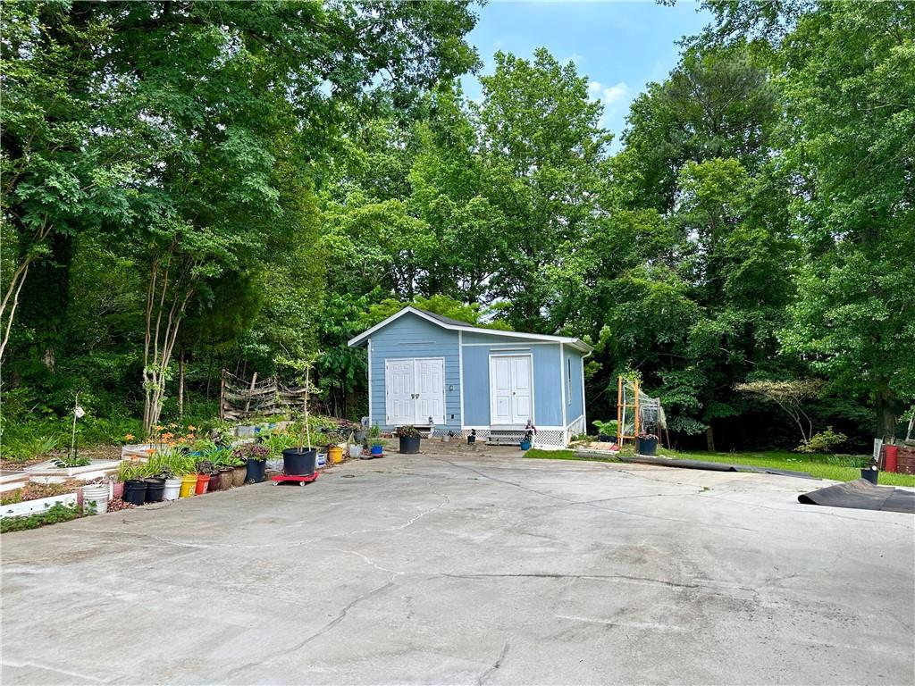7326 Leland Lane Jonesboro, GA 30236 - Photo 2 of 18 a view of backyard of house with green space
