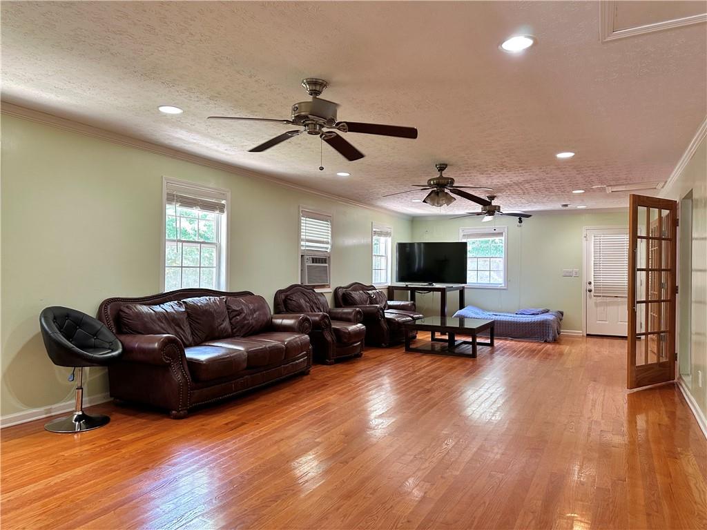 7326 Leland Lane Jonesboro, GA 30236 - Photo 5 of 18 a living room with furniture and a flat screen tv