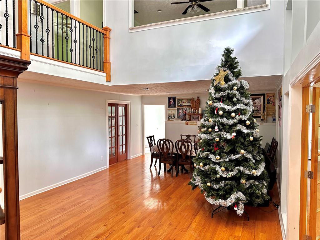 7326 Leland Lane Jonesboro, GA 30236 - Photo 6 of 18 a view of a porch with furniture and wooden floor