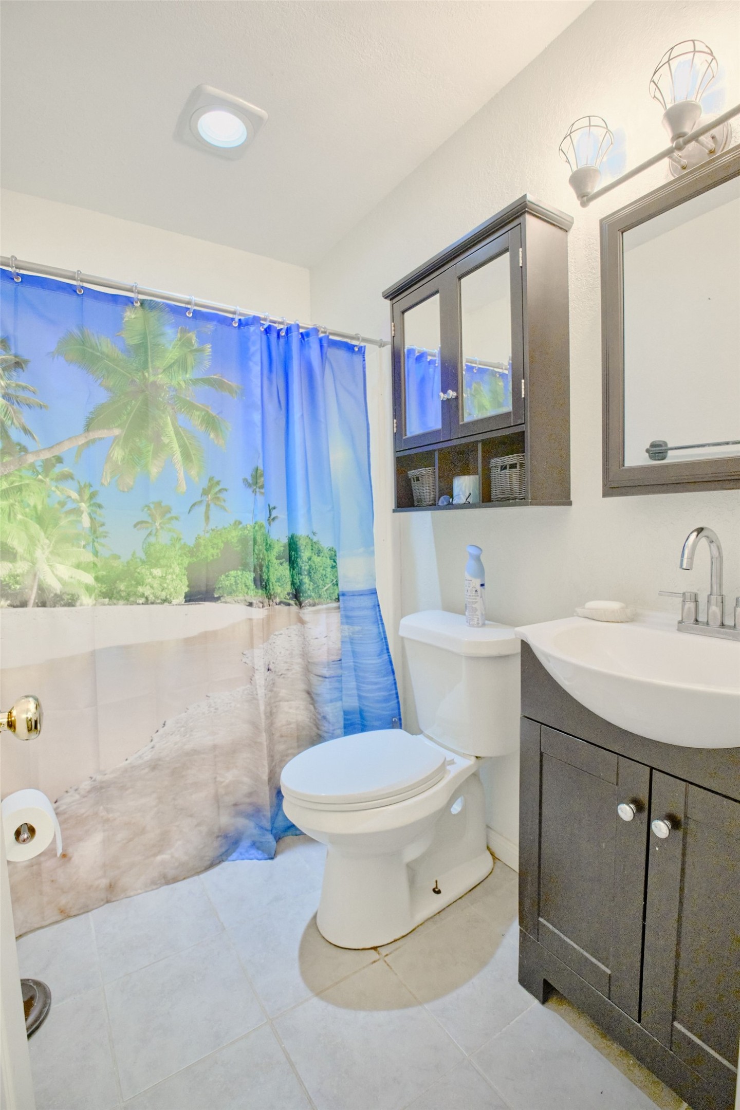 729 Newman Street Angleton, TX 77515 - Photo 17 of 24 a bathroom with a sink a toilet and mirror