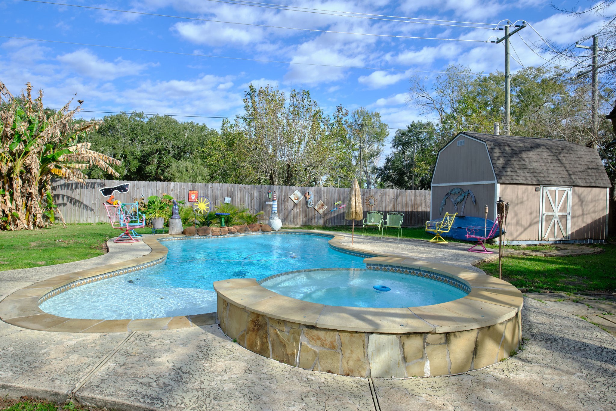 729 Newman Street Angleton, TX 77515 - Photo 20 of 24 a view of a fountain in front of a house
