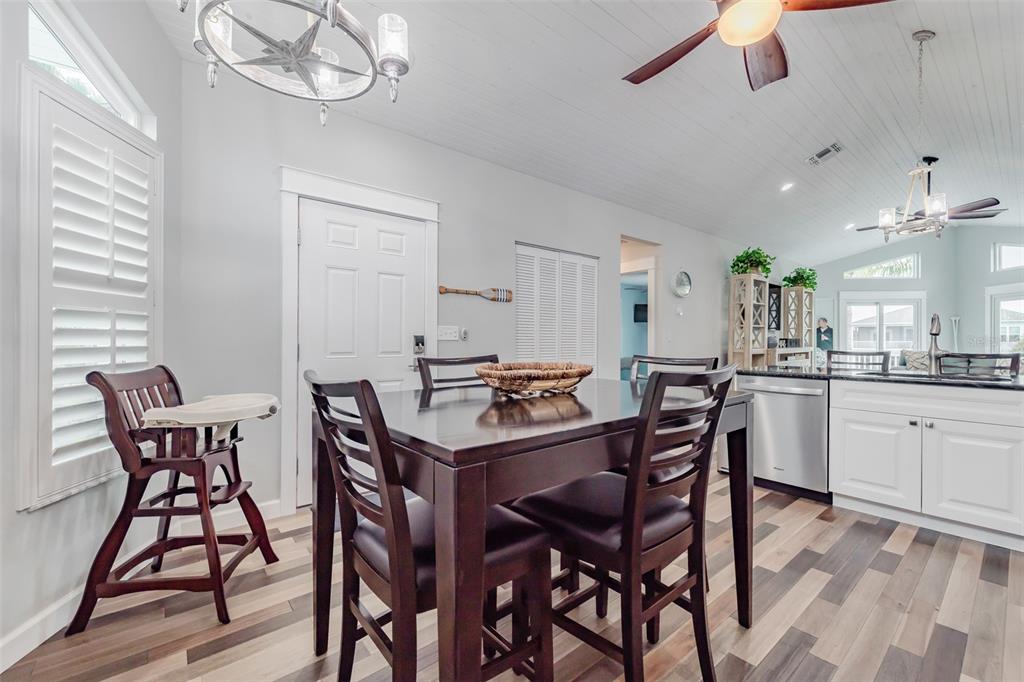 4021 Casa Court Hernando Beach, FL 34607 - Photo 17 of 37 a view of a dining room with furniture and chandelier