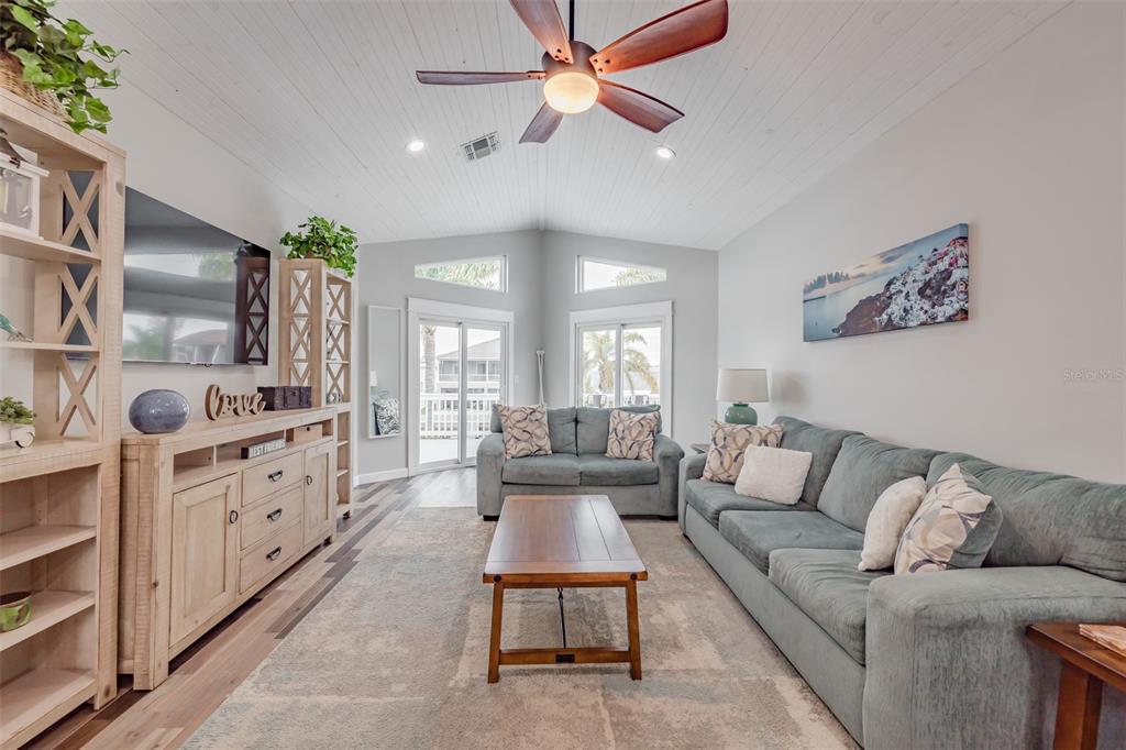 4021 Casa Court Hernando Beach, FL 34607 - Photo 18 of 37 a living room with furniture and a large window