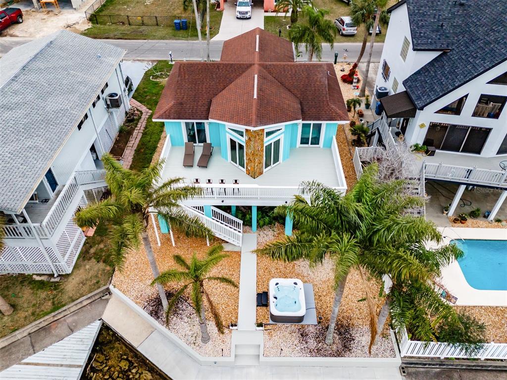 4021 Casa Court Hernando Beach, FL 34607 - Photo 25 of 37 an aerial view of multiple houses with yard