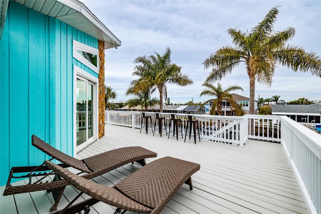 4021 Casa Court Hernando Beach, FL 34607 - Photo 3 of 37 a view of a chairs on the roof deck