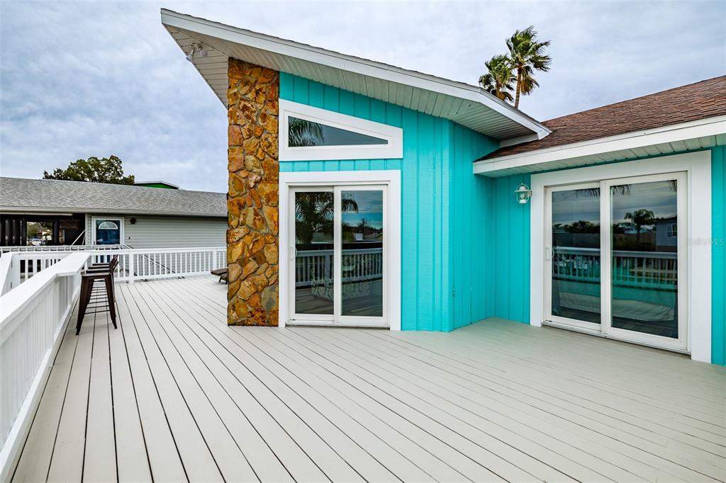 4021 Casa Court Hernando Beach, FL 34607 - Photo 4 of 37 a view of a house with a porch