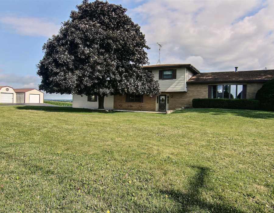 14851 Freeport Road Durand, IL 61024 - Photo 1 of 25 a view of a house with a yard