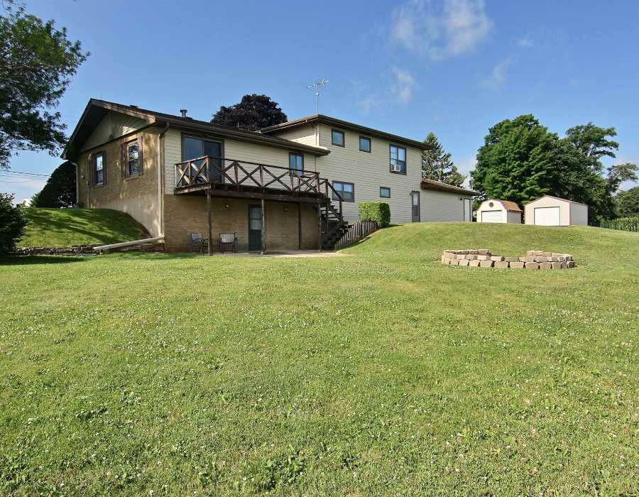 14851 Freeport Road Durand, IL 61024 - Photo 22 of 25 a view of a house with a big yard