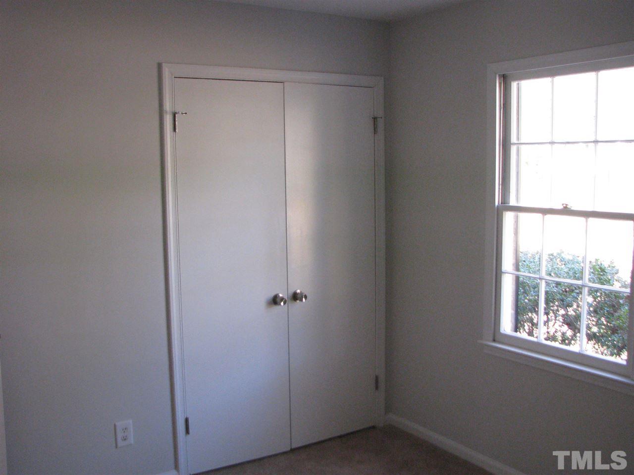 1101 Mockingbird Drive Raleigh, NC 27615 - Photo 11 of 21 a view of an empty room with a window