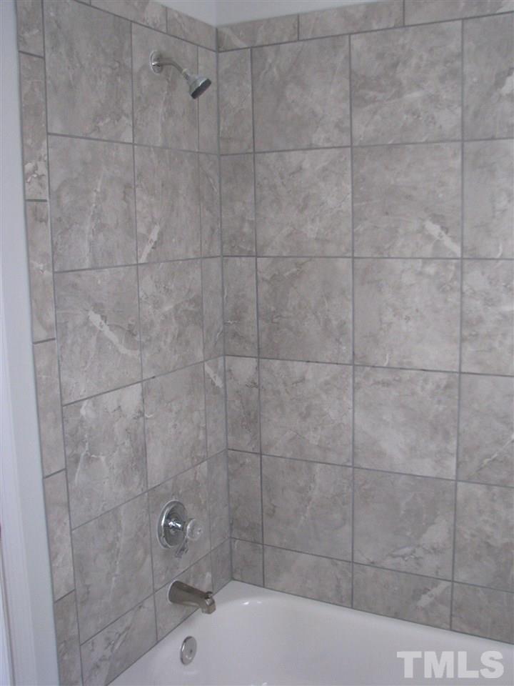 1101 Mockingbird Drive Raleigh, NC 27615 - Photo 18 of 21 a bathroom with a shower