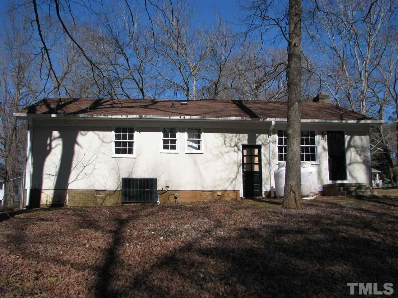 1101 Mockingbird Drive Raleigh, NC 27615 - Photo 19 of 21 a view of a car park in front of house