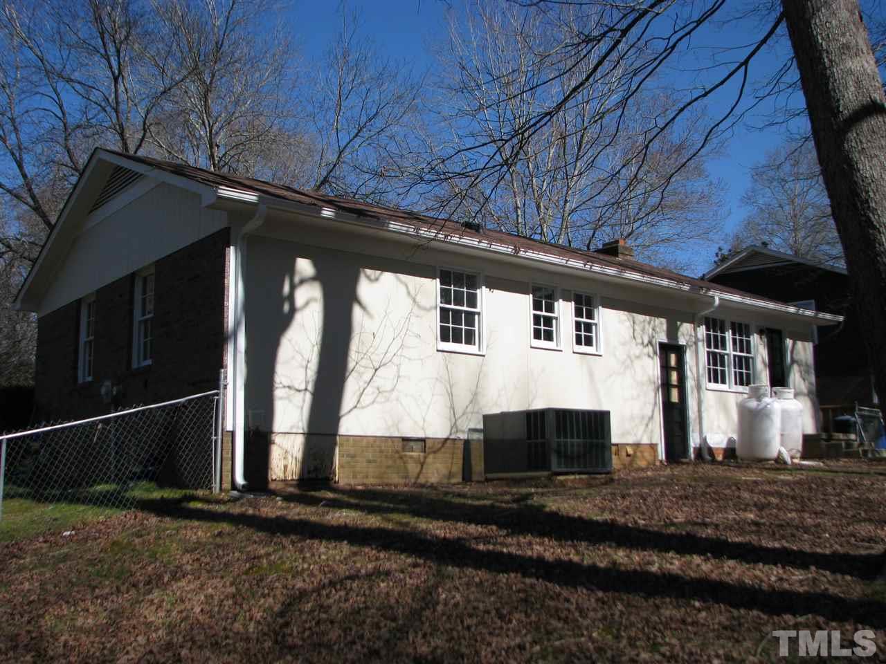 1101 Mockingbird Drive Raleigh, NC 27615 - Photo 20 of 21 a view of back yard of the house