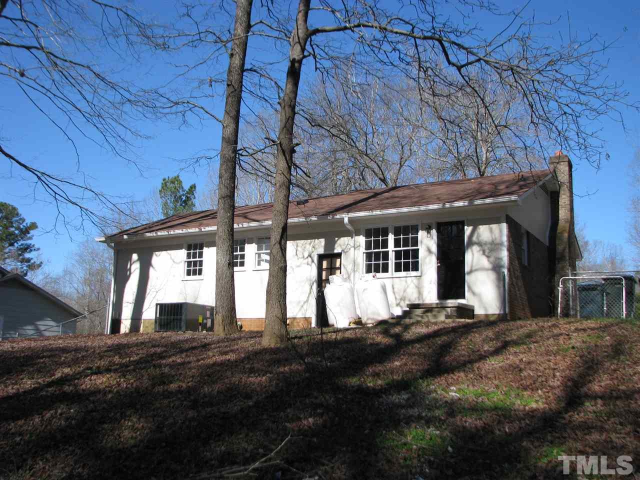 1101 Mockingbird Drive Raleigh, NC 27615 - Photo 21 of 21 a view of a house with a yard
