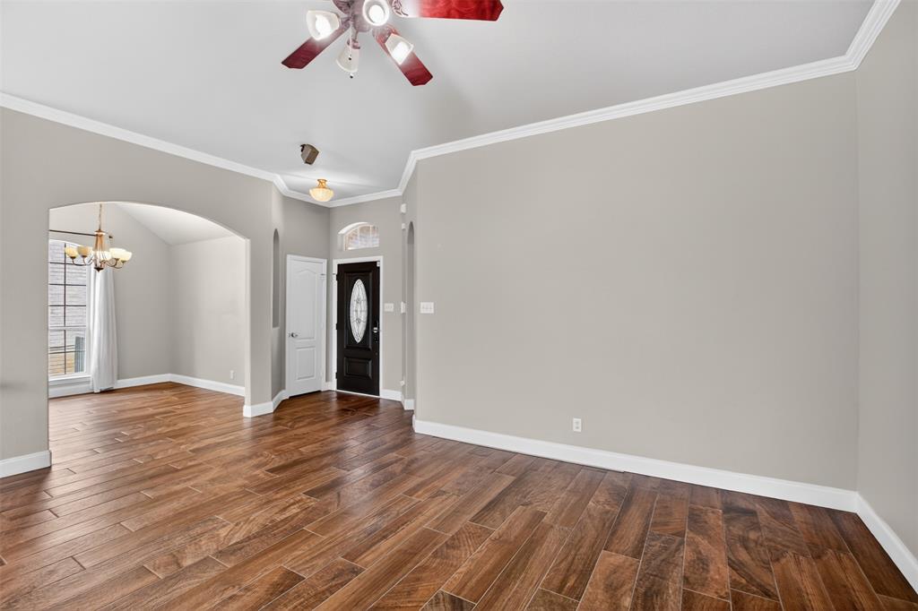 8208 Riversprings Drive Fort Worth, TX 76053 - Photo 11 of 26 a view of an empty room with wooden floor