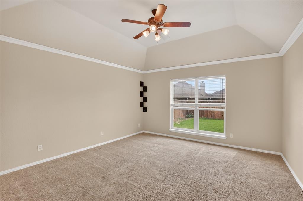 8208 Riversprings Drive Fort Worth, TX 76053 - Photo 15 of 26 an empty room with windows and ceiling fan