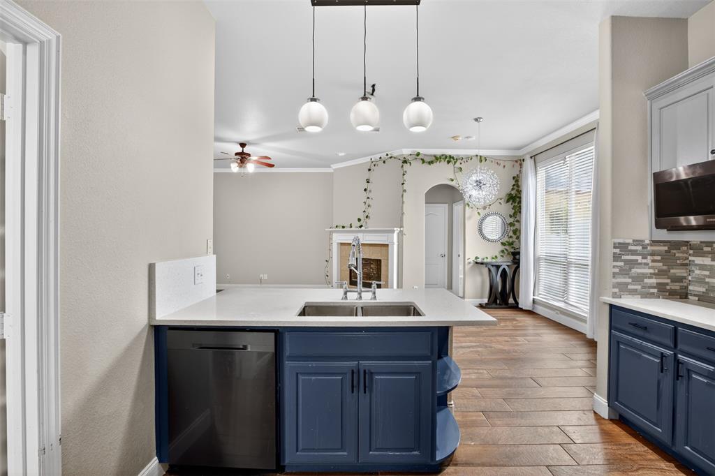 8208 Riversprings Drive Fort Worth, TX 76053 - Photo 6 of 26 a spacious bathroom with a granite countertop sink a mirror and a bathtub