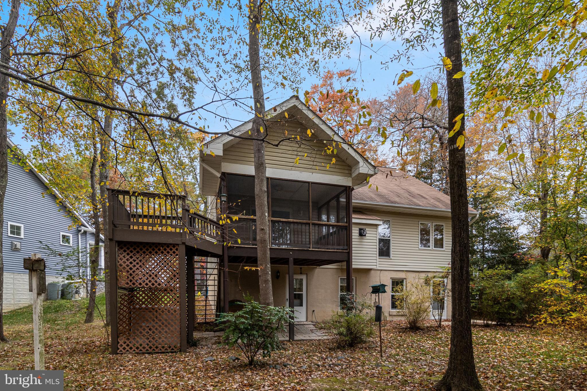 44087 Granite Way California, MD 20619 - Photo 13 of 53 Rear w/ patio & screened porch